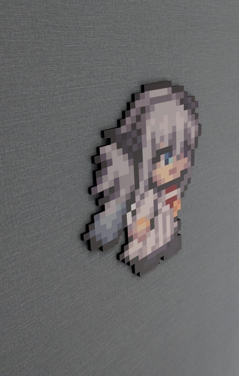 壁に貼られたドット絵のパネル